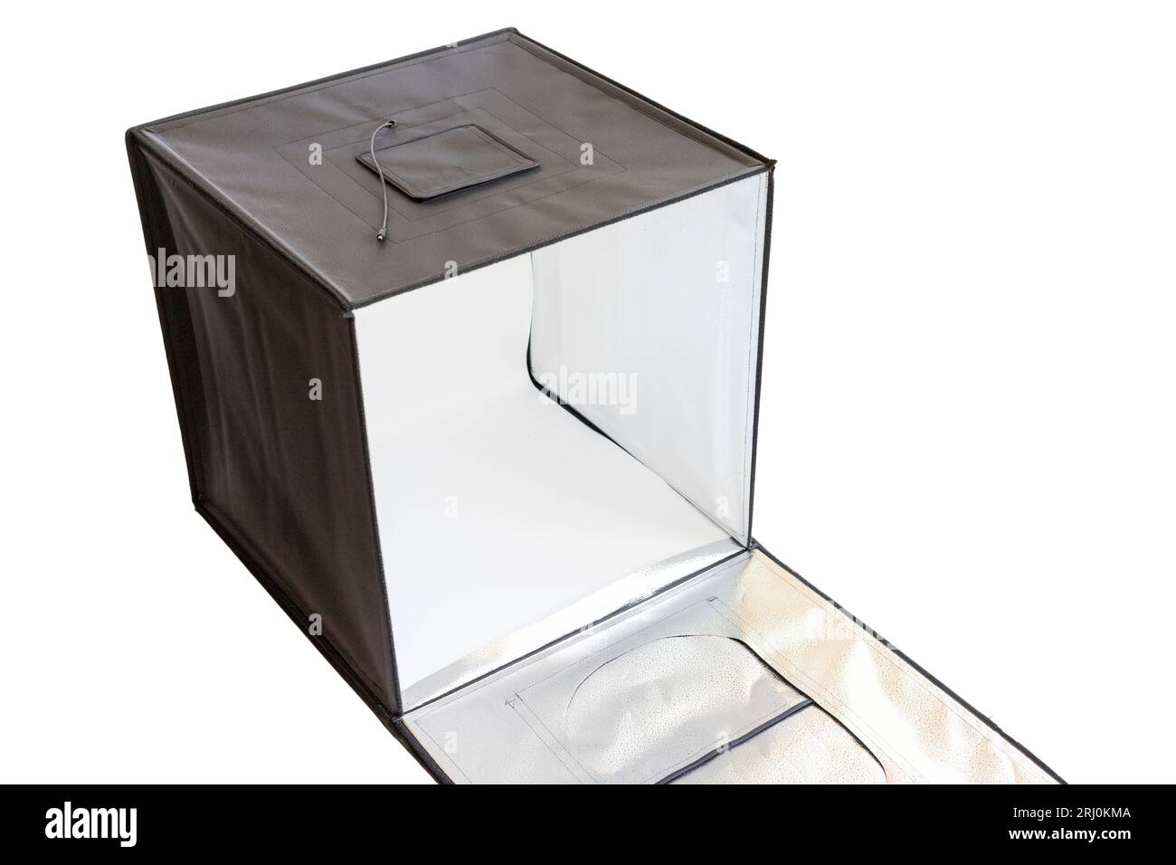 Boîte de photographie de produit avec des lumières sur fond isolé blanc Banque D'Images