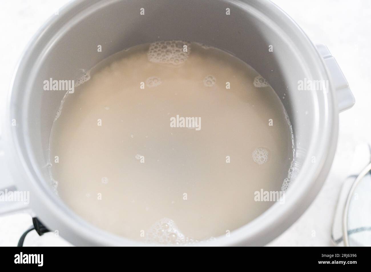 Cuisson du riz Banque D'Images Cuisson du riz Banque D'Images