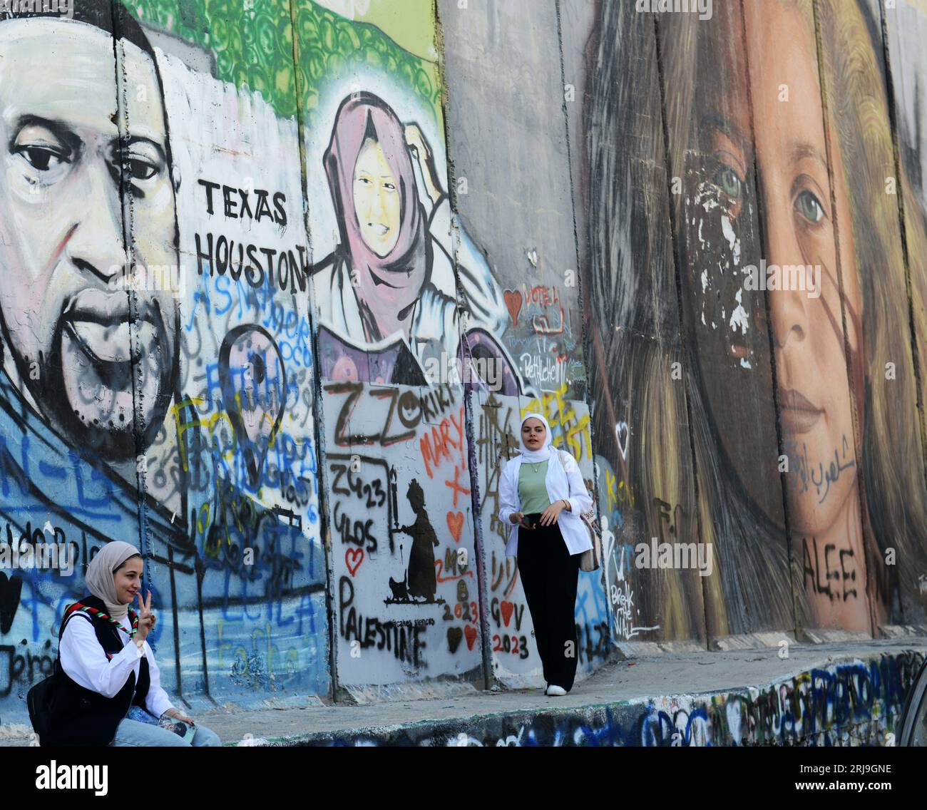 Peintures murales sur la barrière de sécurité israélienne à Bethléem, Palestine. Banque D'Images