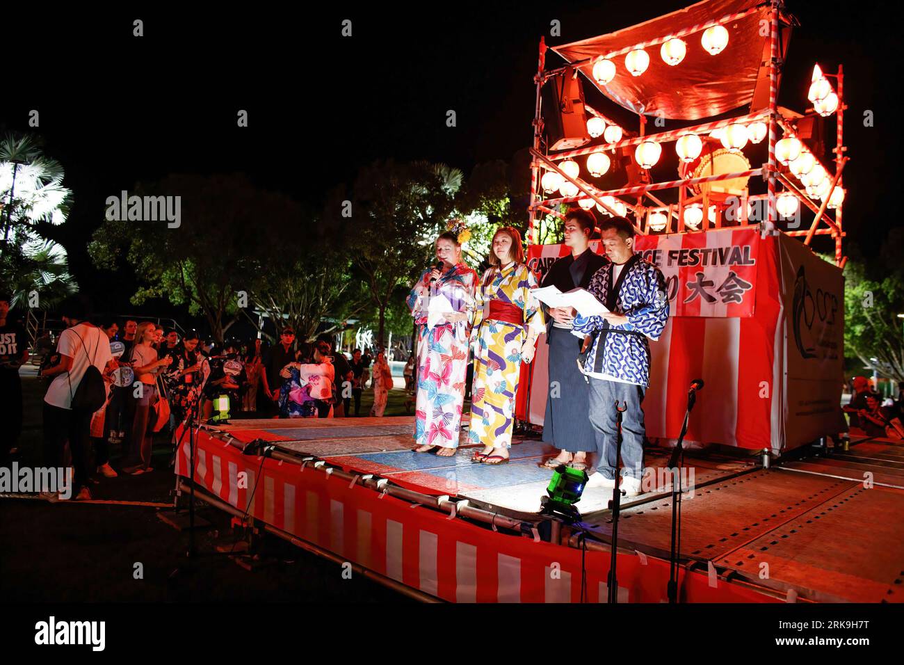 Cairns, Australia. 12th Aug, 2023. Members of the Japanese Society of Cairns speak to the crowd during the Japan Bon Dance Festival on the Cairns Esplanade. (Photo by Joshua Prieto/SOPA Images/Sipa USA) Credit: Sipa USA/Alamy Live News Banque D'Images