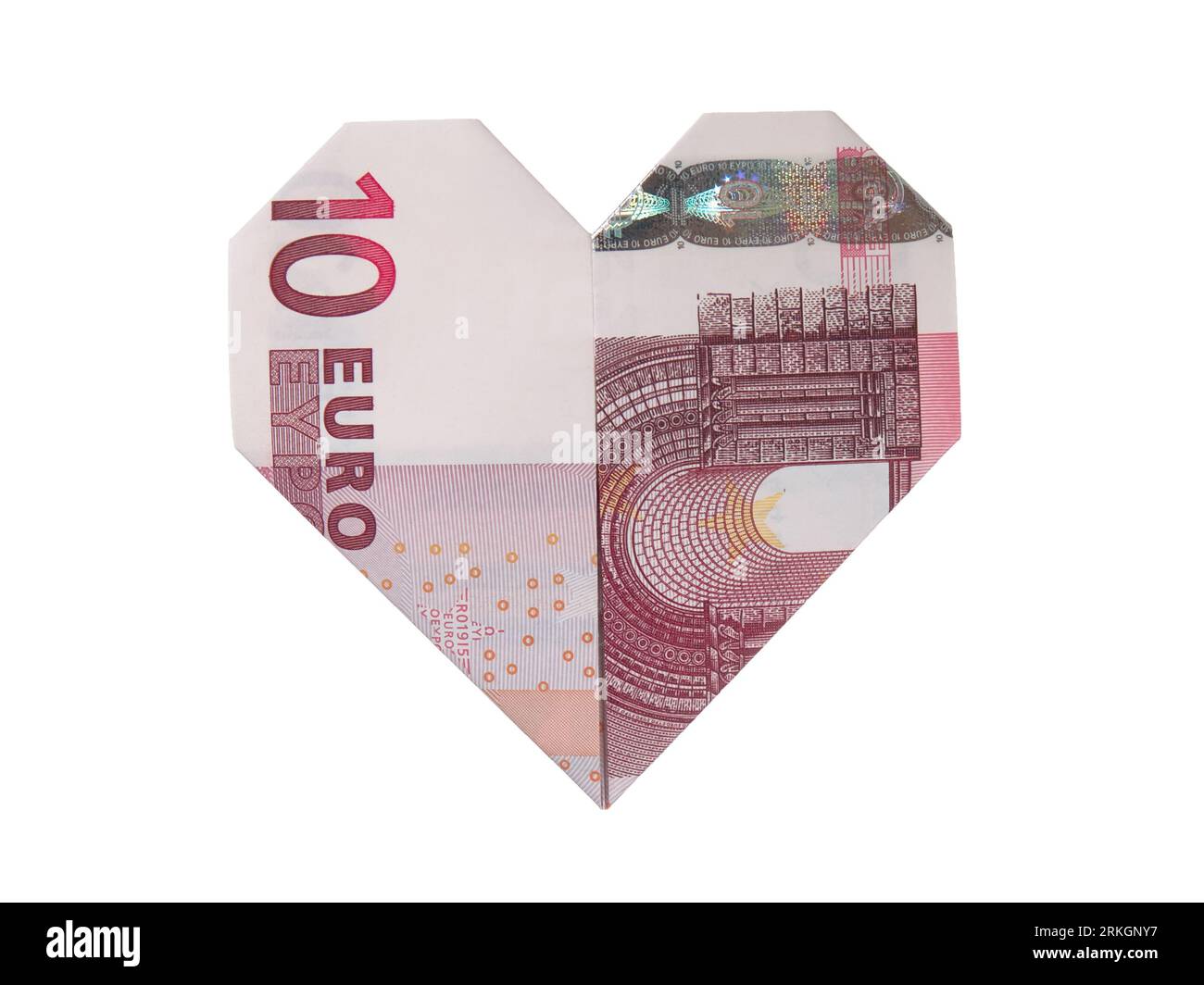 Un gros plan d'un coeur d'un billet de dix euros plié, avec un fond blanc Banque D'Images