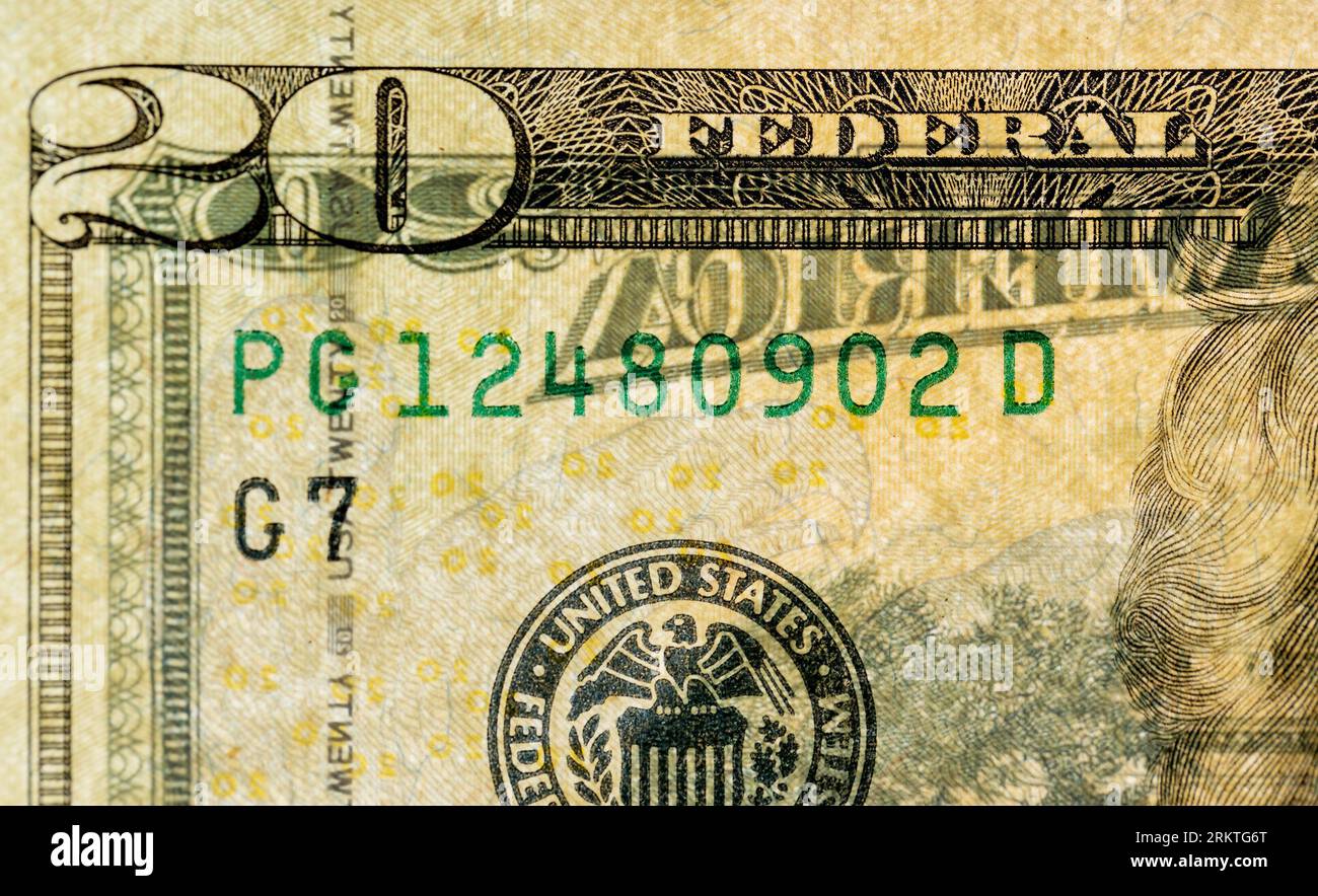 Gros plan de vingt dollars américains transparents à la lumière, détails de 20 dollars américains cash simultanément des deux côtés Banque D'Images