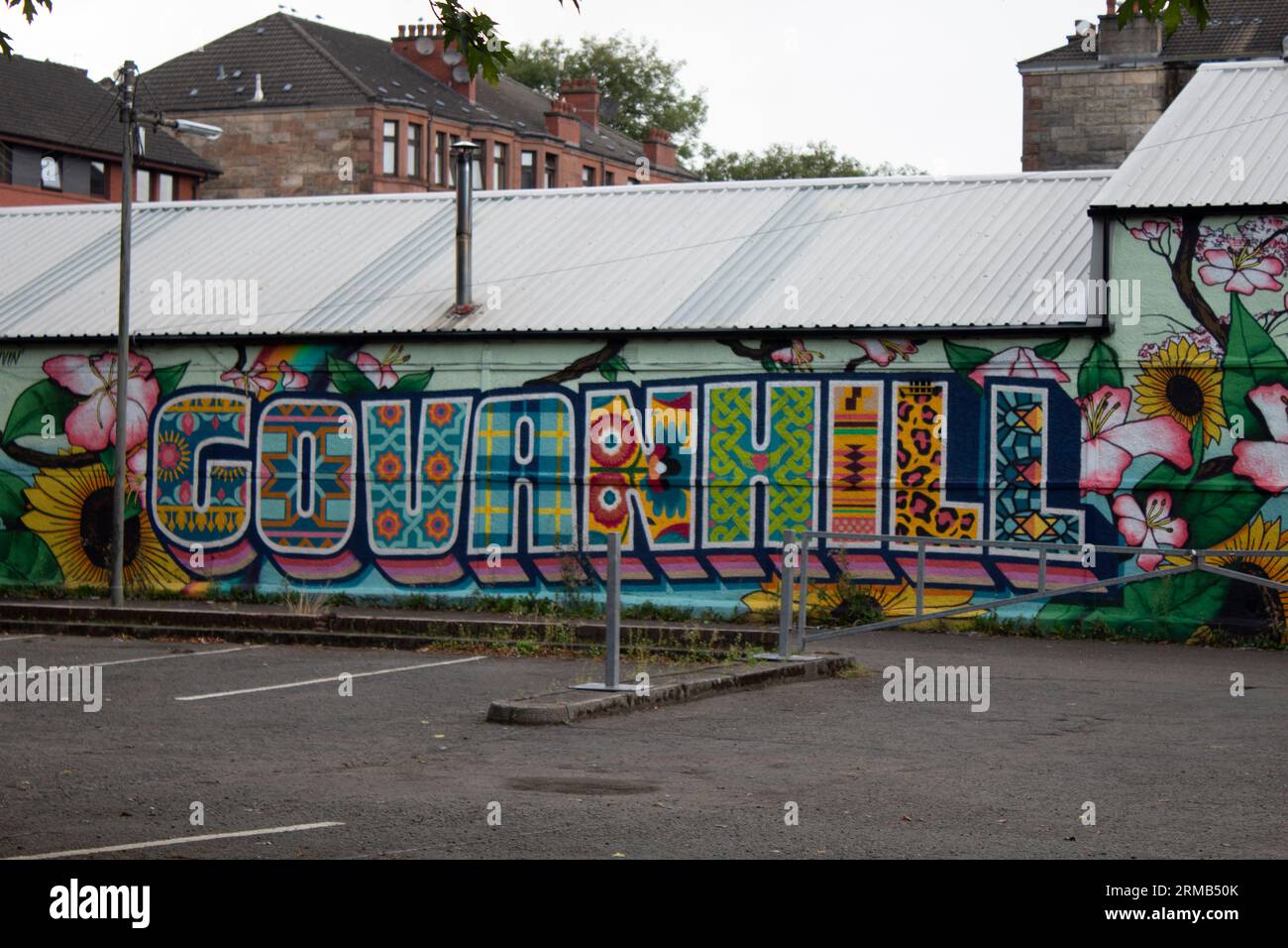 Le nom du quartier résidentiel Govanhill de Glasgow, graffiti sur un mur de l'Écosse Banque D'Images