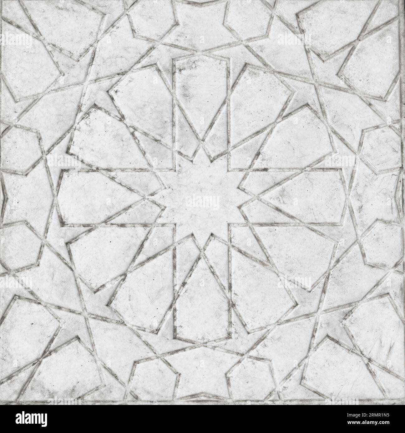 Ornement islamique traditionnel géométrique. Fragment d'une mosaïque sculptée sur marbre blanc. Arrière-plan abstrait. Banque D'Images