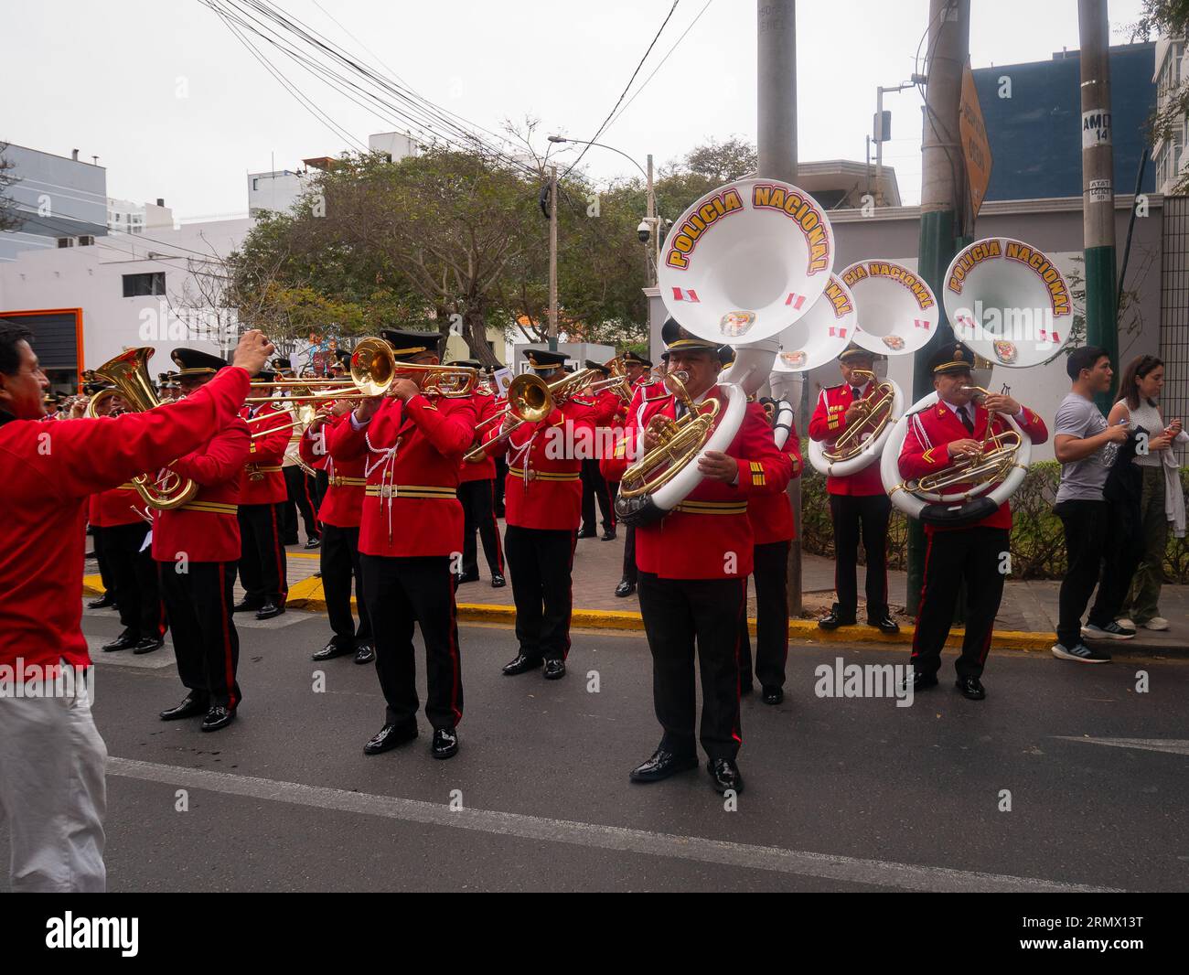 Lima, Peru - July 29 2023: Peruvian Nen Playing Wind Instruments, Trumpets and Tubas, Preparing for the Peruvian Independence Day Parade Banque D'Images