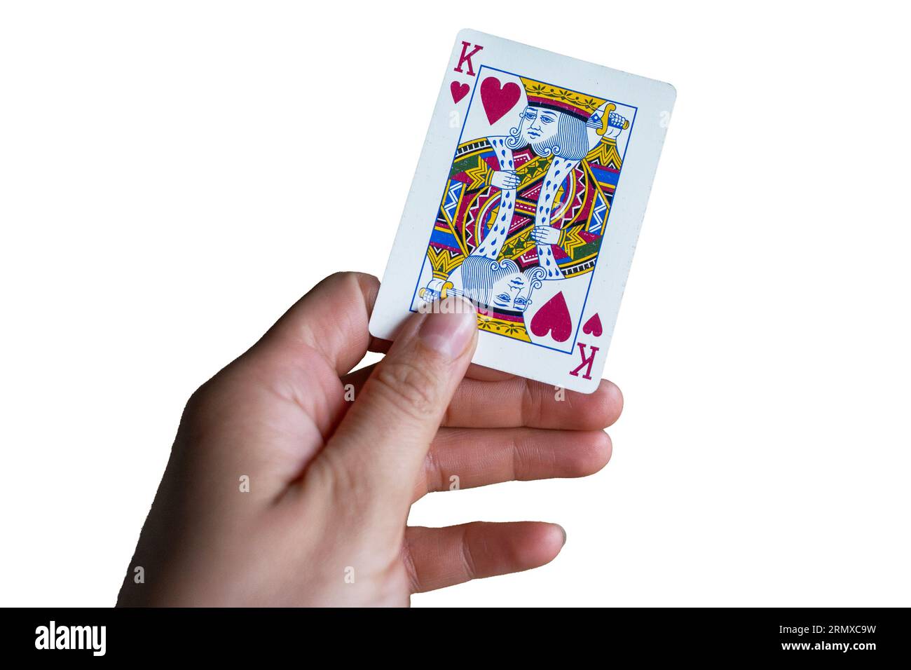 jouer avec des cartes coeur roi gros plan isolé sur fond blanc roi du concept de coeur. Banque D'Images