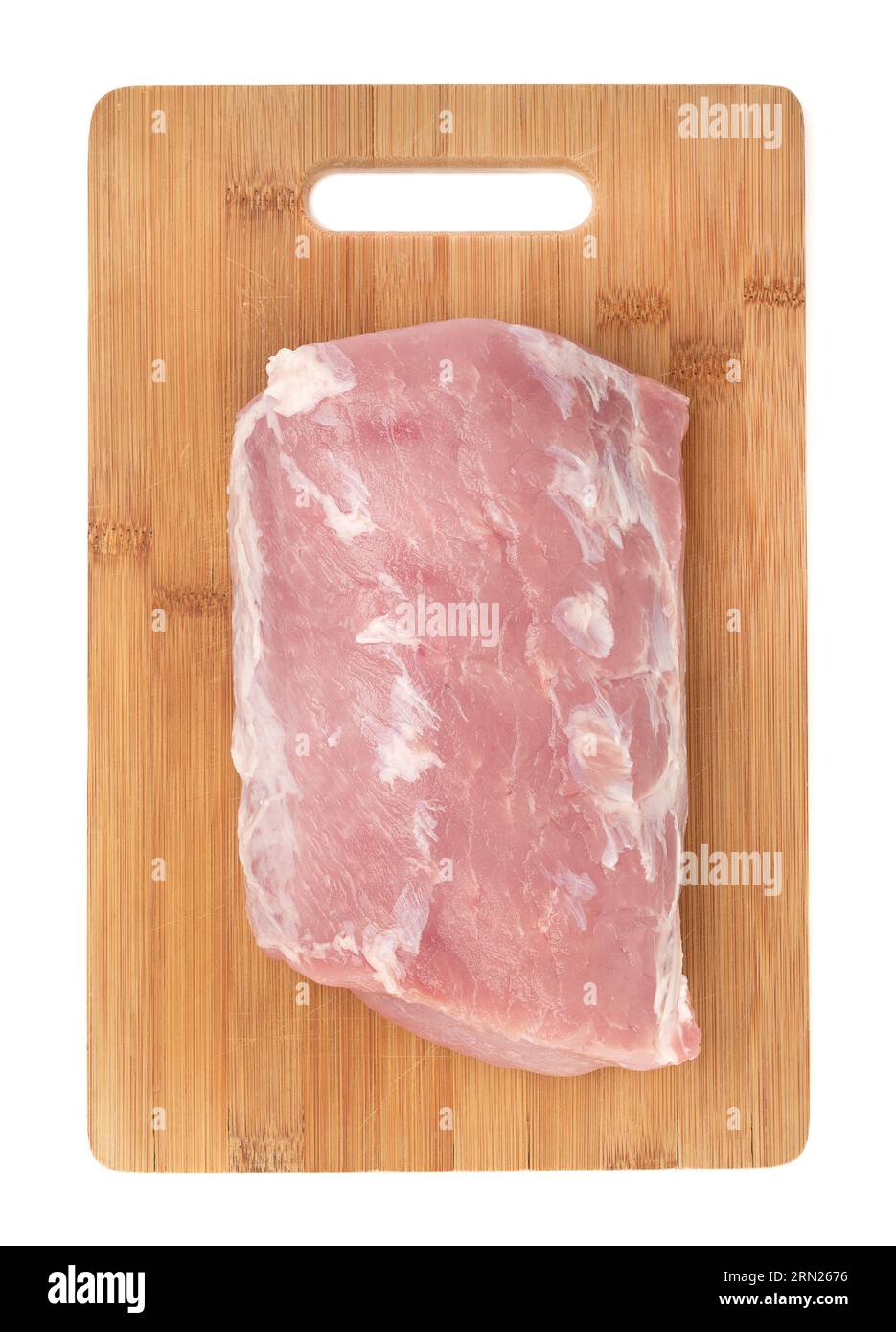 Morceau de viande de porc crue sur une planche à découper en bois. Carbonade. Viande biologique crue. Banque D'Images