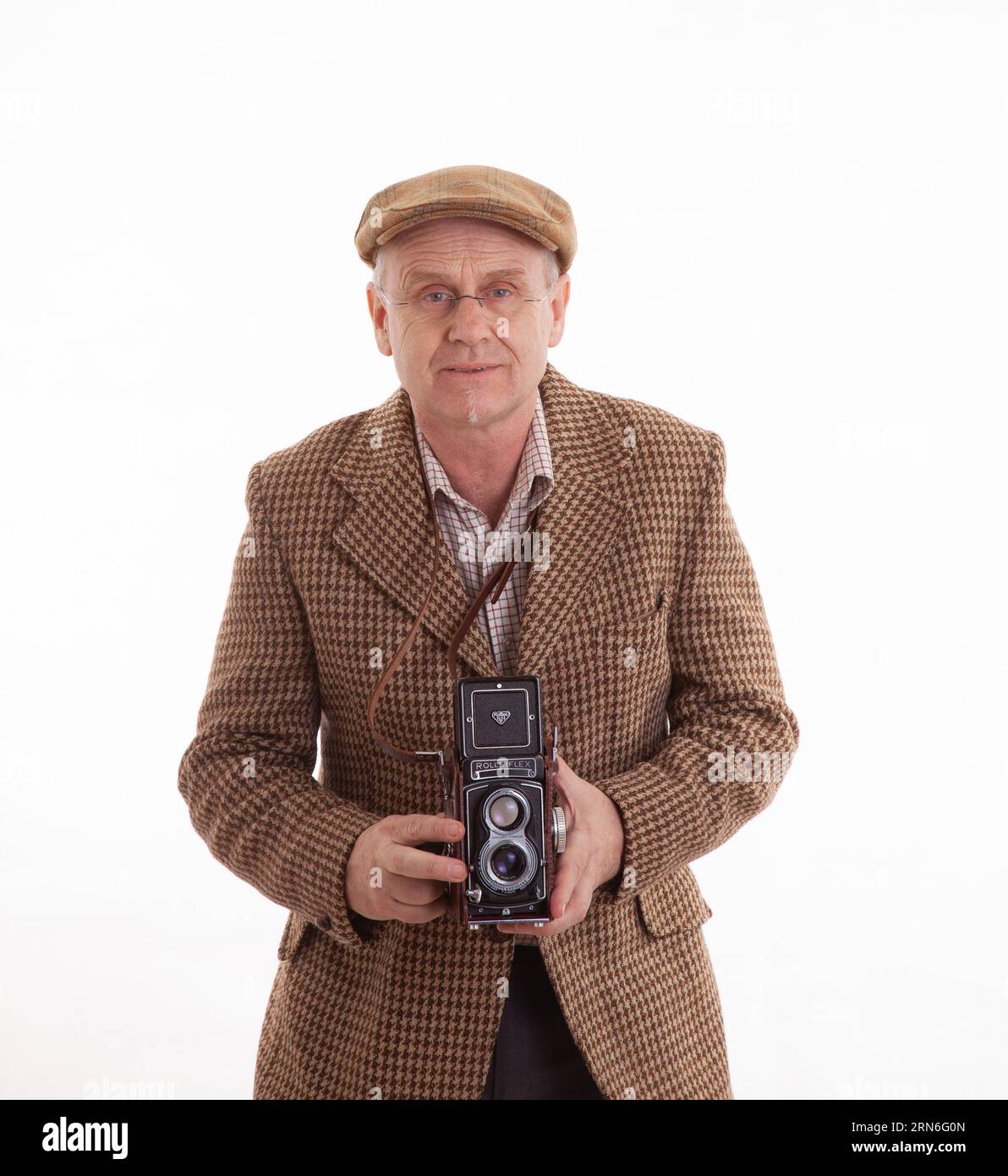Un photographe anglais mature dans tweeds classique Banque D'Images