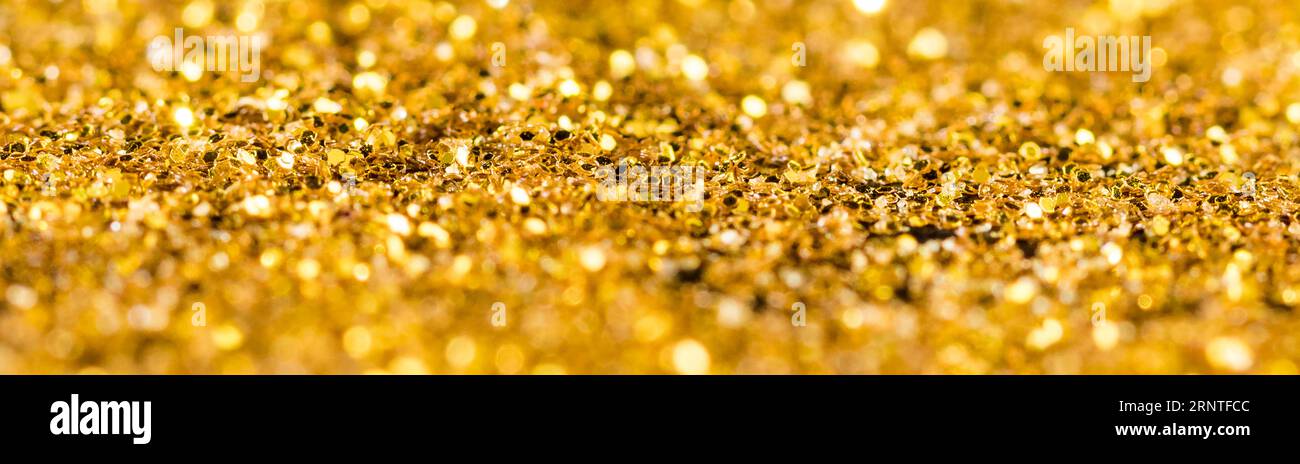 Paillettes dorées réfléchissantes Banque D'Images