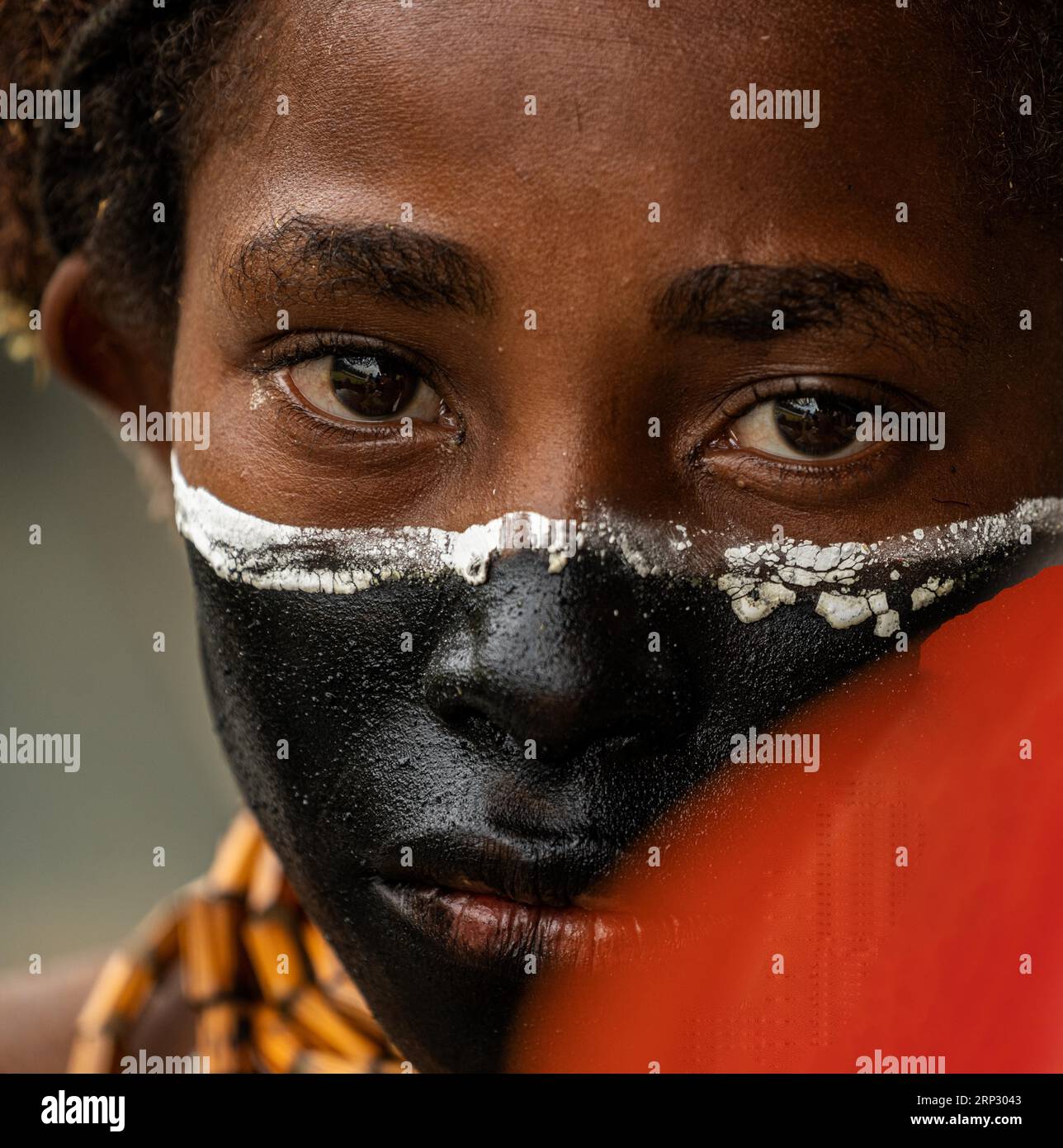 Fille avec peinture faciale, Sing Sing, Festival, Mont Hagen, Papouasie-Nouvelle-Guinée Banque D'Images