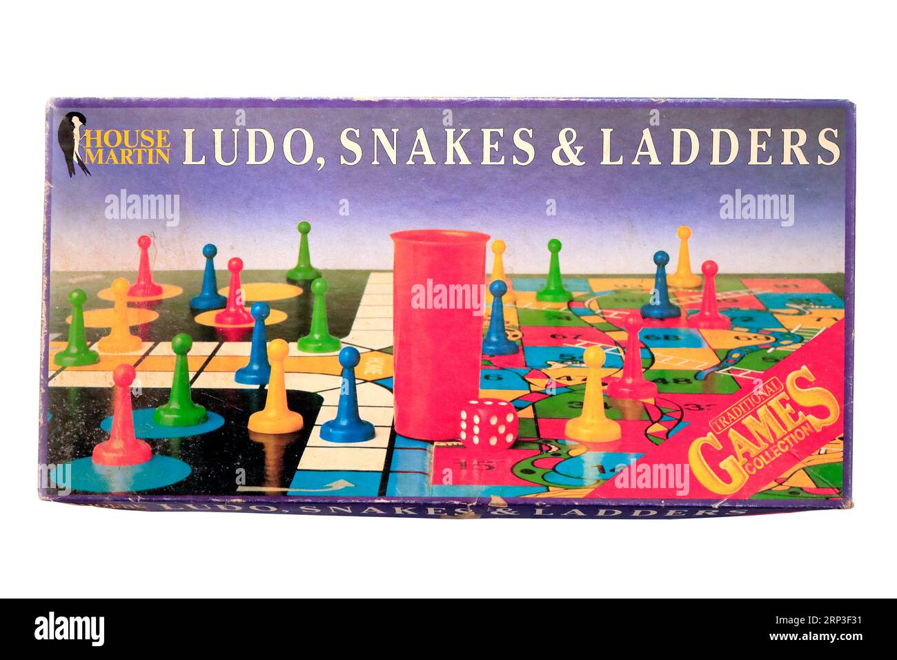 Vieille boîte de jeux - Ludo, Snakes & Ladders. Configuration du studio Banque D'Images