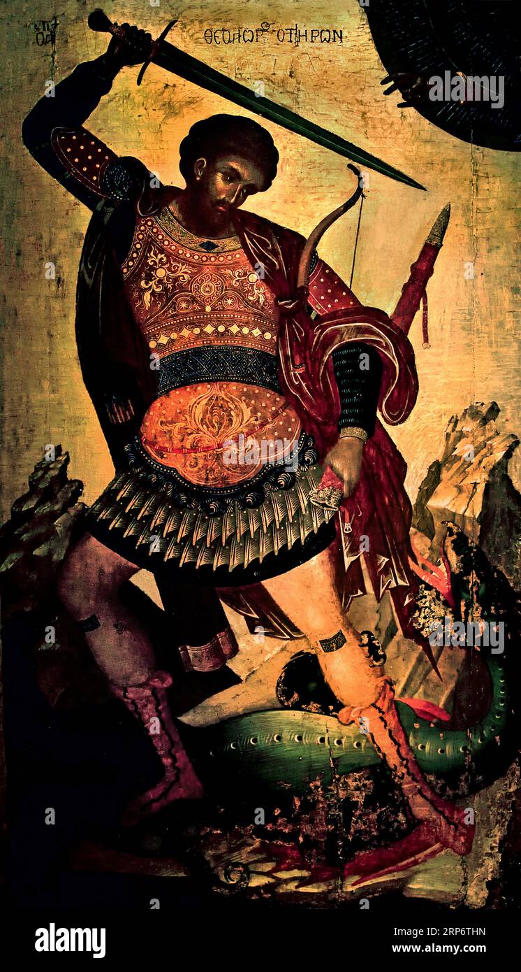 Saint Théodore Tiro donne un coup mortel, avec l'épée brandissant au-dessus de sa tête, au dragon vert écailleux couché à ses pieds. Il porte une robe militaire avec une tunique courte, une cuirasse en cuir, une large ceinture en métal, des épaulettes et une longue cape rouge foncé autour de ses épaules. De Crète. Par : Angelos Akotantos Athènes Grèce Musée byzantin Église orthodoxe grecque ( icon ) Banque D'Images