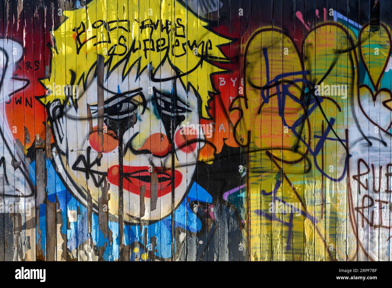 Boris Johnson graffiti/Street art sur une clôture, Fashion Street, Spitalfields, Londres, Royaume-Uni. 7 avril 2023 Banque D'Images