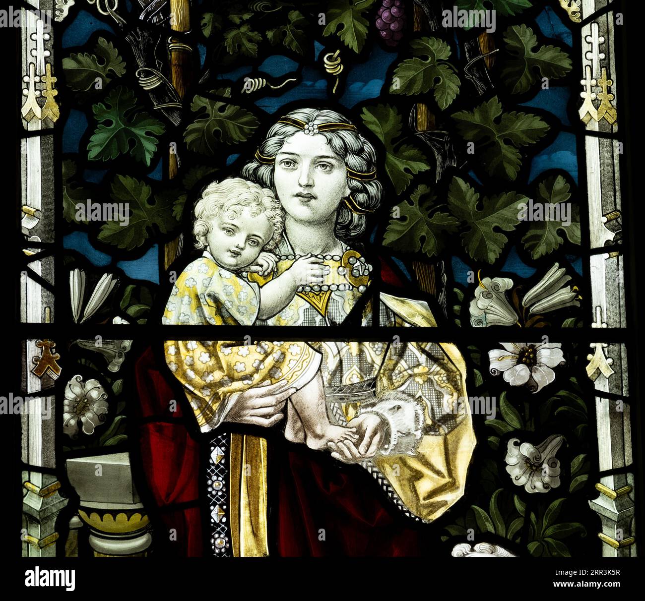 Un détail de vitrail de bonne femme, All Saints Church, Allesley, West Midlands, Angleterre, ROYAUME-UNI Banque D'Images