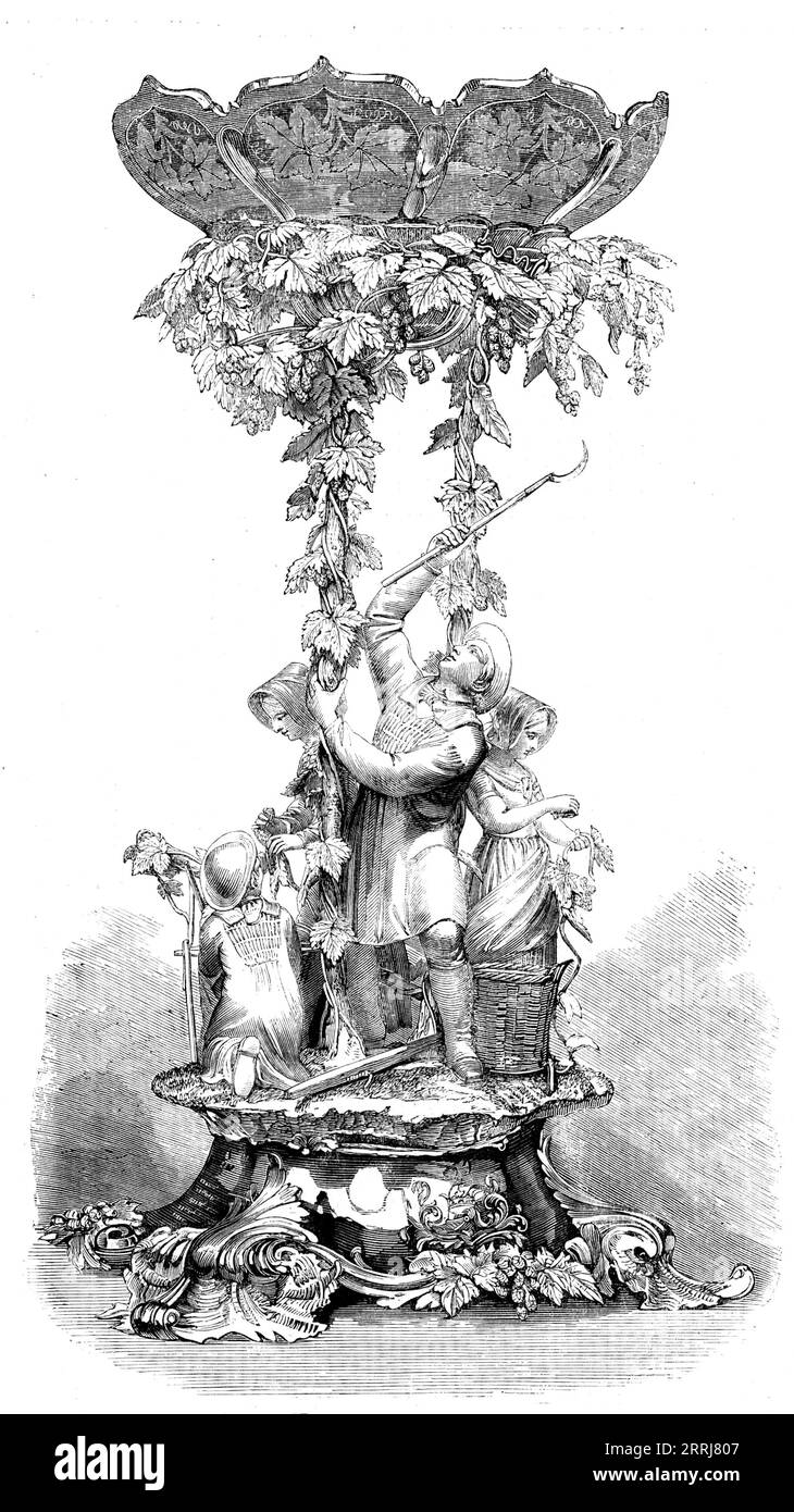 Témoignage à M. Fuller, 1858. Le témoignage que nous avons gravé devait être présenté au regretté M. Eliott Fuller, mais, sa mort survenant avant la fin des travaux, il a été décidé par les souscripteurs qu'il devrait être présenté à son fils, M. Fuller Meyrick, en souvenir de leur admiration pour son père. Le groupe représente un groupe de cueilleurs de houblon pendant la récolte, à partir de croquis réalisés sur place par M. Gastenau. Les chiffres sont particulièrement heureux, et les différents outils utilisés par les ouvriers sont des modèles exacts des originaux. En tant qu'œuvre d'art, c'est wor Banque D'Images