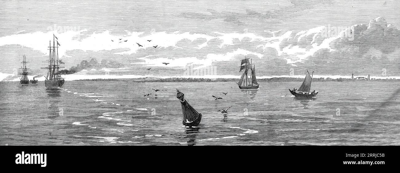 Phare de Saugor, au large de l'embouchure du Hooghly, [Inde], 1876. 'L'île de Saugor, sur laquelle se dresse le phare de fer pour guider les navires approchant Calcutta alors qu'ils entrent dans la rivière Hooghly, est située sur le côté est du chenal navigable le plus couramment utilisé... le phare, érigé sur Middleton point, a été construit en Angleterre, et a été placé où il est en 1853. Le Hooghly, qui a sept canaux différents ouverts aux navires entrant dans la baie du Bengale, mesure environ 125 miles de long. Il est formé par la confluence des ruisseaux Bhagruttee et Jellinghee, deux grands décalages du Gan Banque D'Images