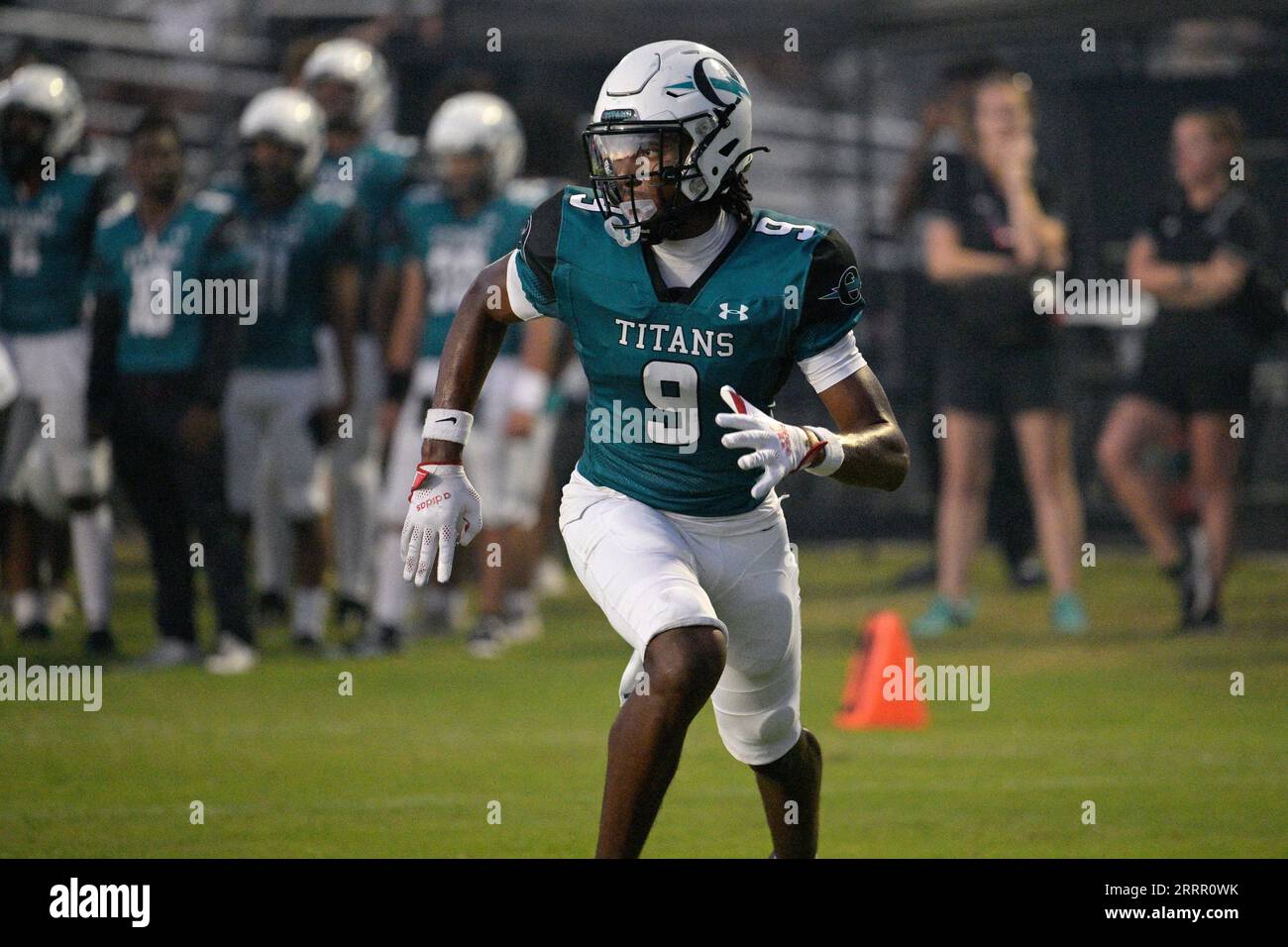 Olympia receiver Josh Evans (9) runs a route during the first half of a high school football game against Lake Nona, Friday, Sept. 8, 2023, in Orlando, Fla. (Phelan M. Ebenhack via AP) Banque D'Images