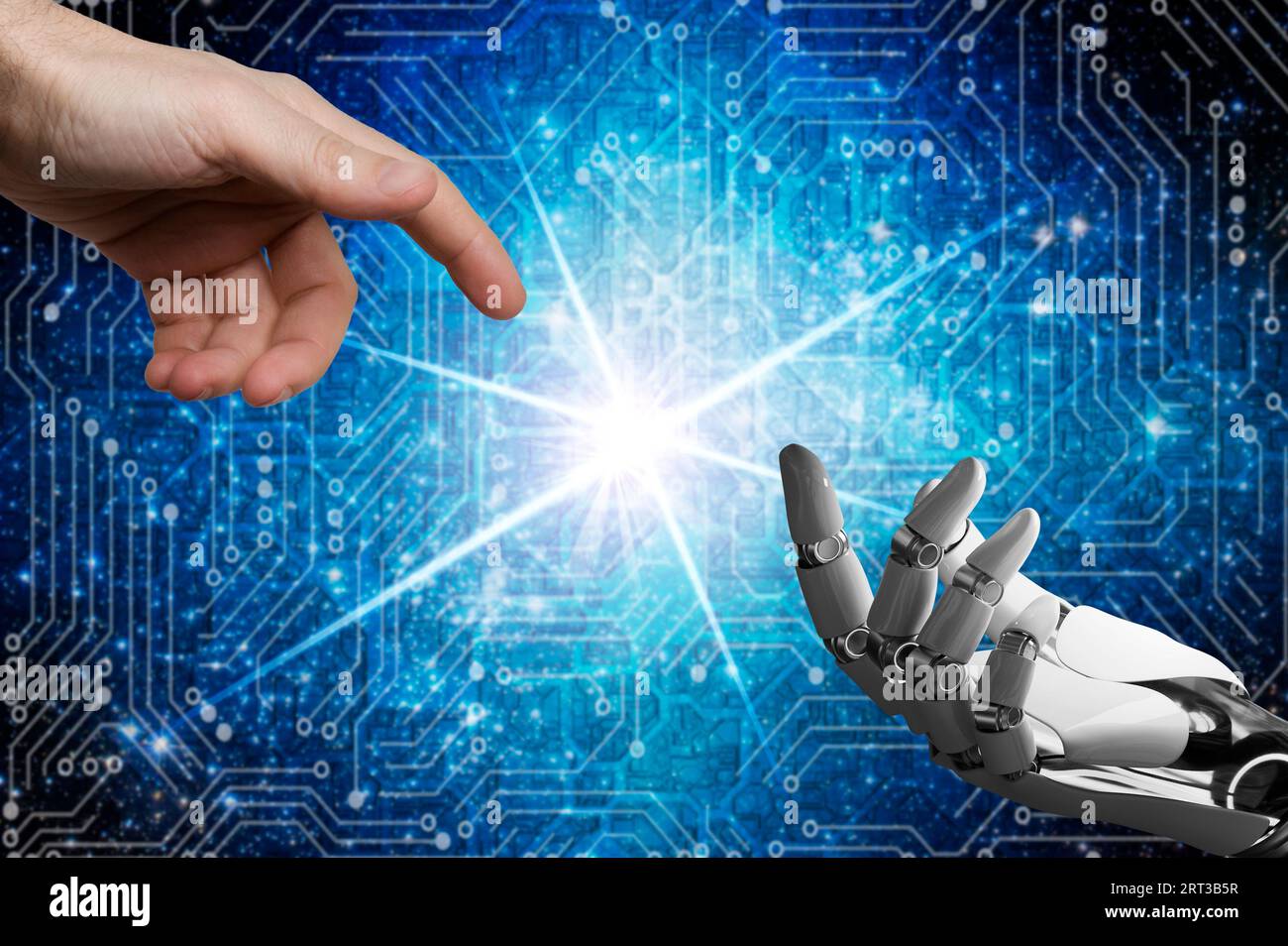 main humaine touchant une main de robot Banque D'Images