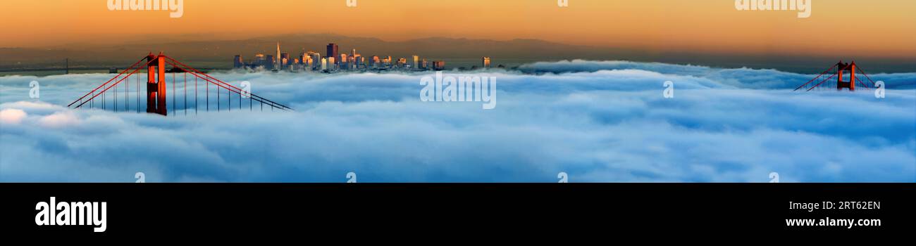 Vue du brouillard qui s'élève sur le Golden Gate Bridge depuis la zone de loisirs nationale du Golden Gate à l'extérieur de San Francisco, Californie. Banque D'Images