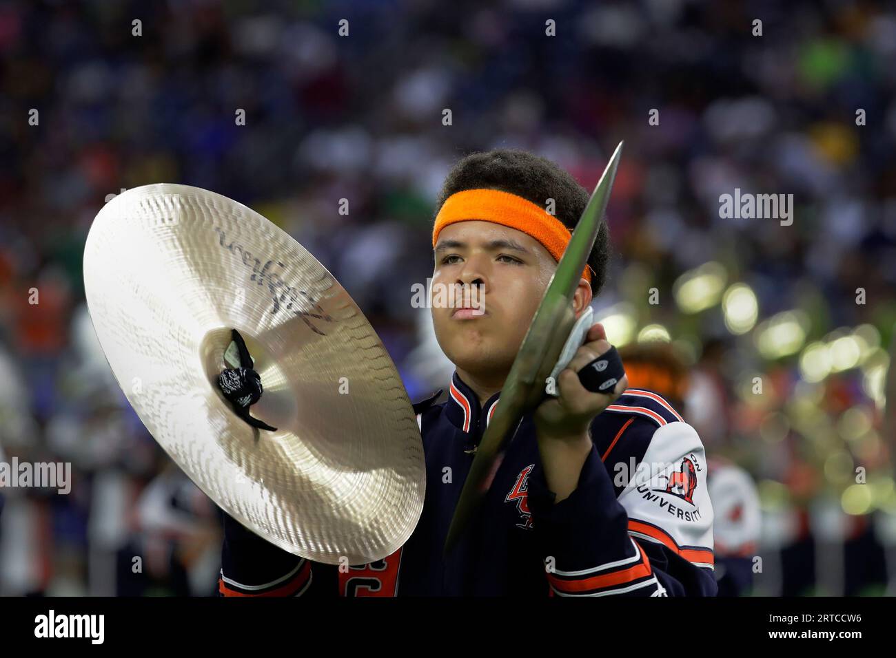 A cymbal players with the Langston University Marching Pride marching band performs with the band during the 2023 National Battle of the Bands, a showcase for HBCU marching bands, held at NRG Stadium Saturday, Aug. 26, 2023, in Houston. (AP Photo/Michael Wyke) Banque D'Images
