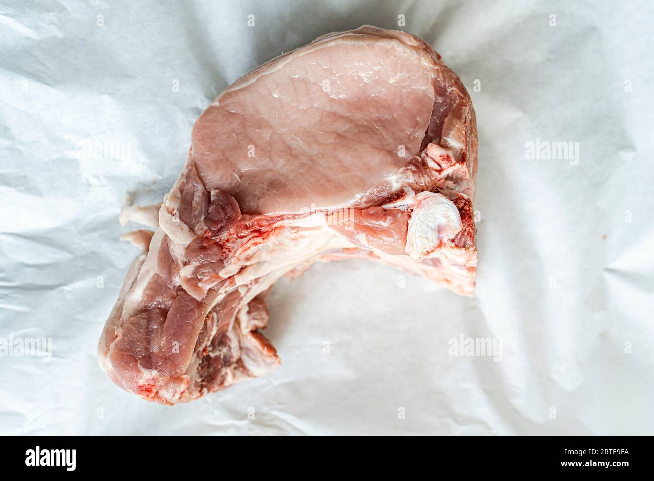 Côtelette de porc cru Banque D'Images