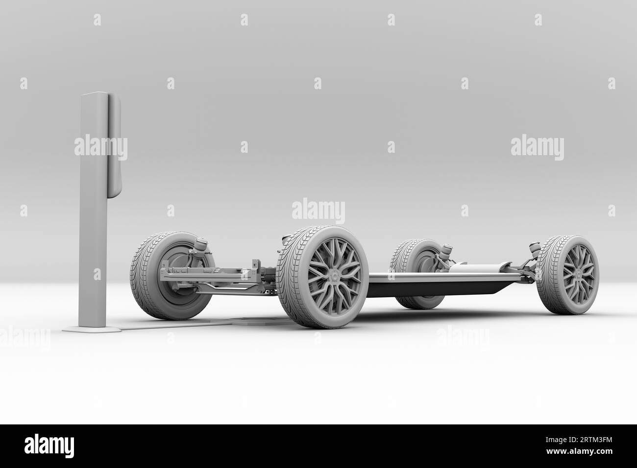 Rendu d'argile de véhicule électrique châssis équipé de moteurs dans-roue , charge sans fil dans la station de charge. Image de rendu 3D. Banque D'Images
