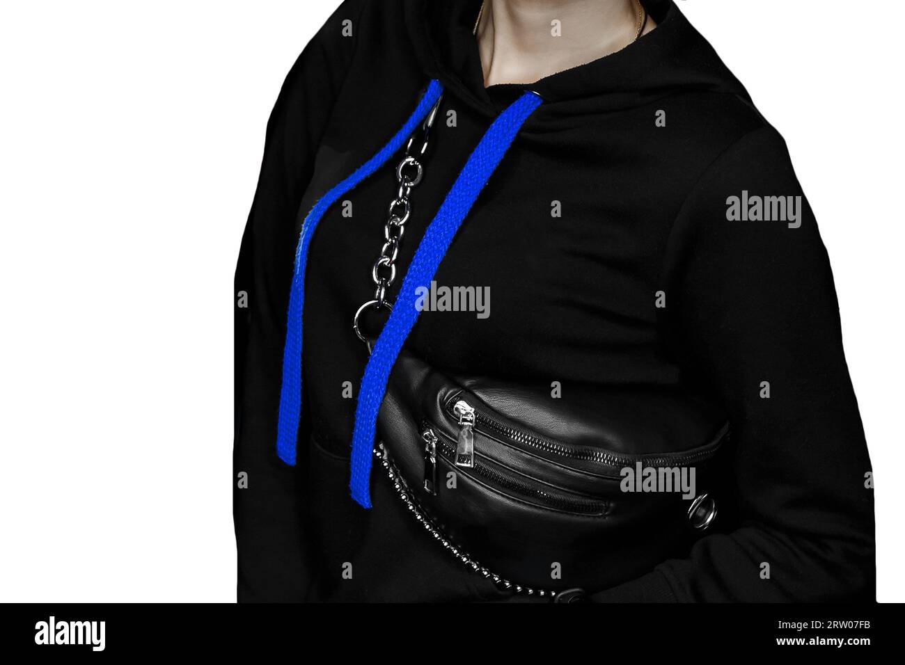 Un vélo noir avec de grands lacets bleus longs, un style féminin de vêtements à la maison et un sac sur un fond blanc isolé. Banque D'Images