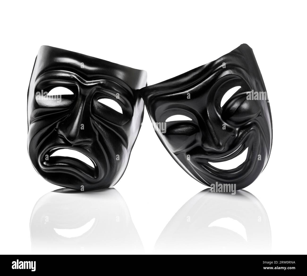Les masques en plastique générique comme symboles théâtrale isolé sur blanc avec reflet Banque D'Images