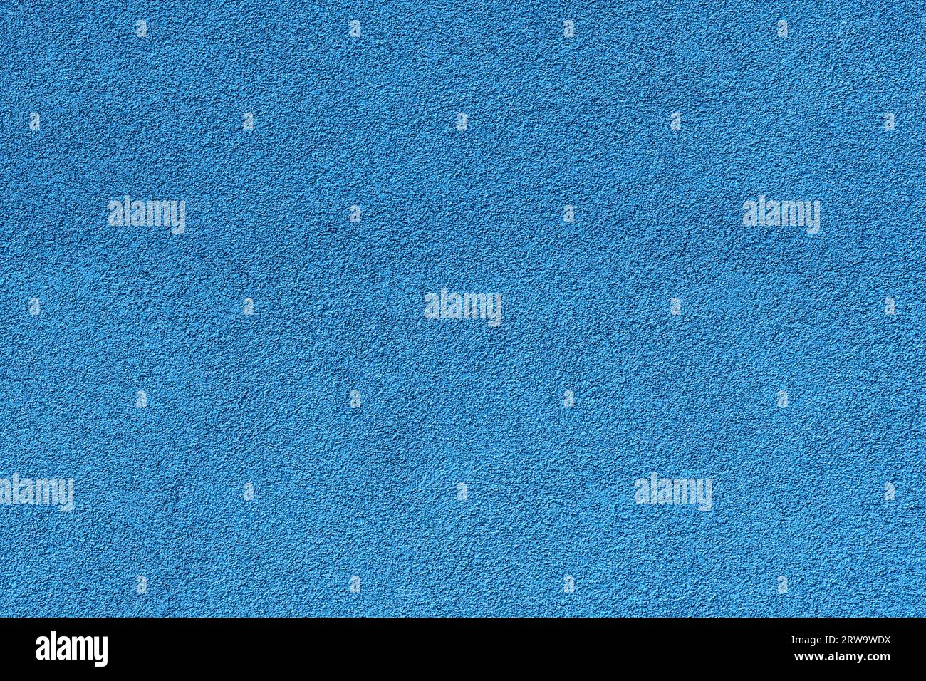 Texture du mur décoratif de plâtre minéral gratté de façade bleue comme fond, photo haute résolution Banque D'Images