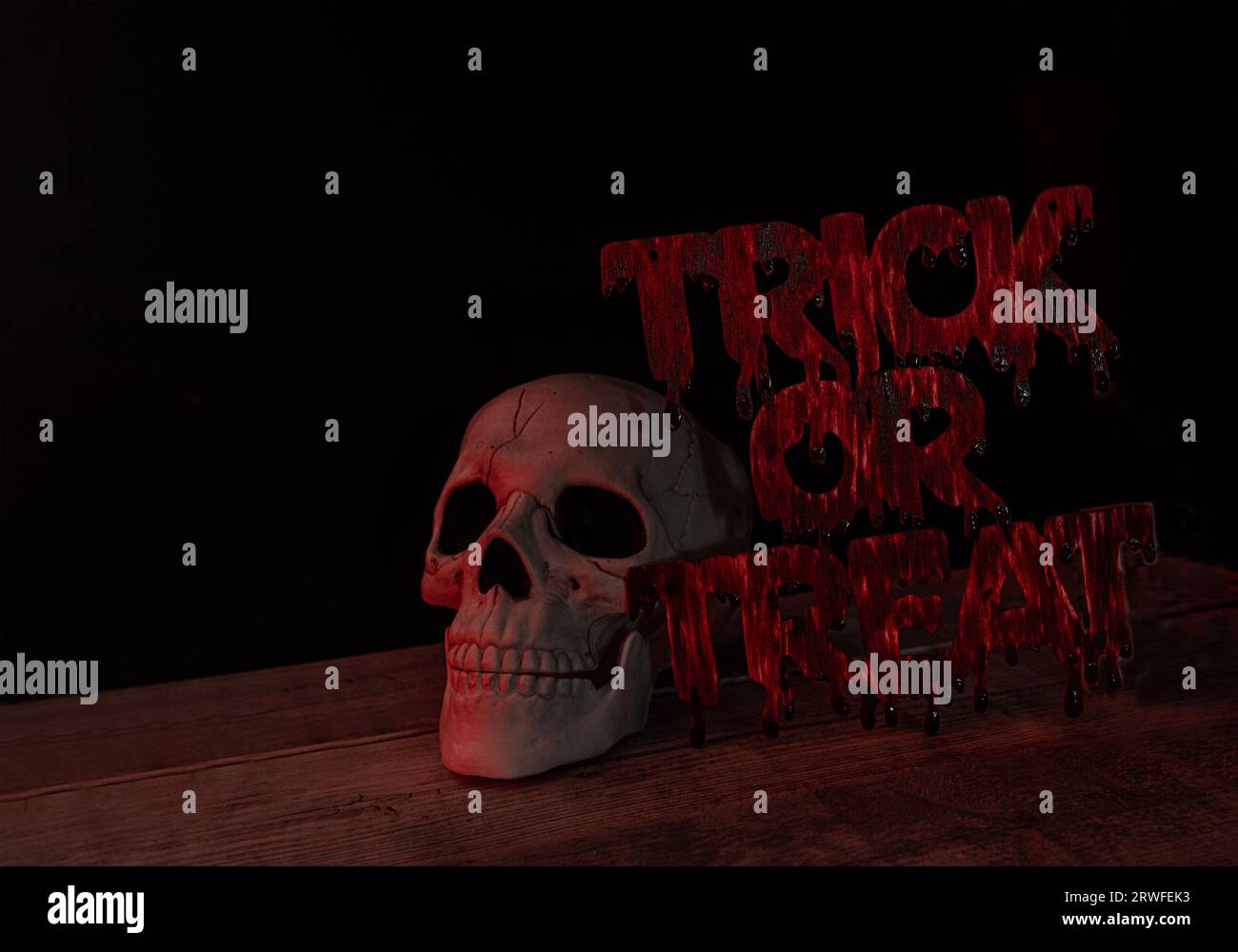 Signe de friandise ou de friandise avec du sang qui coule de la chausse. Banque D'Images
