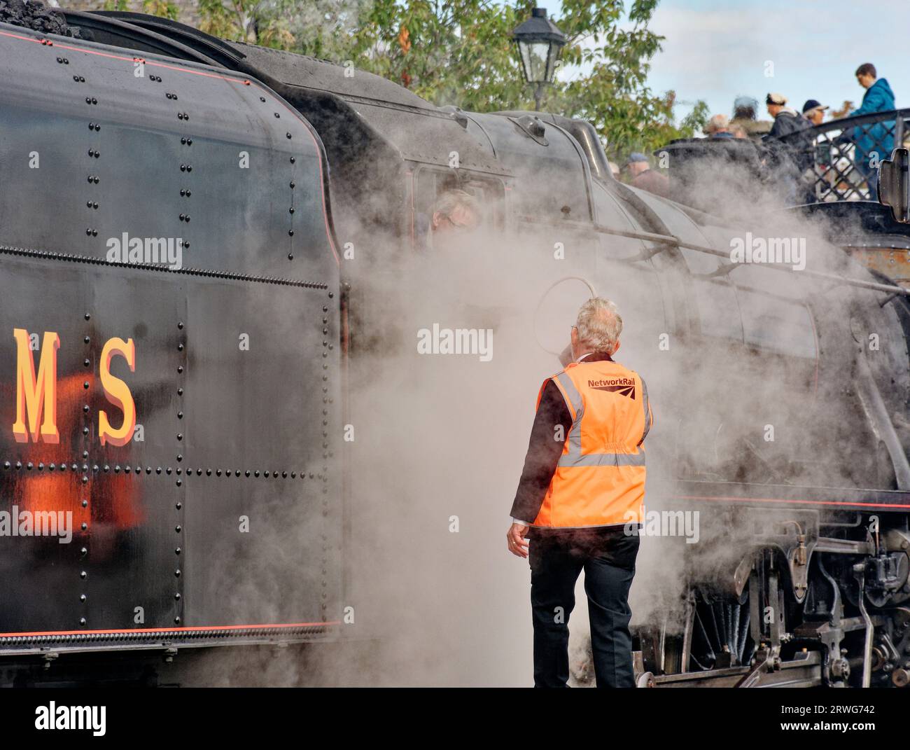 Bateau de Garten Scotland signal rallye vapeur passant le jeton au conducteur de train Banque D'Images