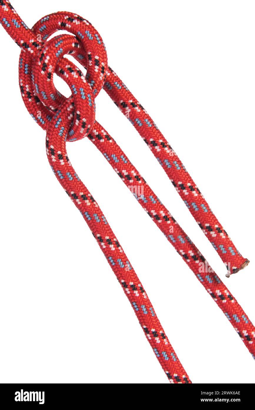 une corde d'escalade rouge nouée sur un fond transparent Banque D'Images