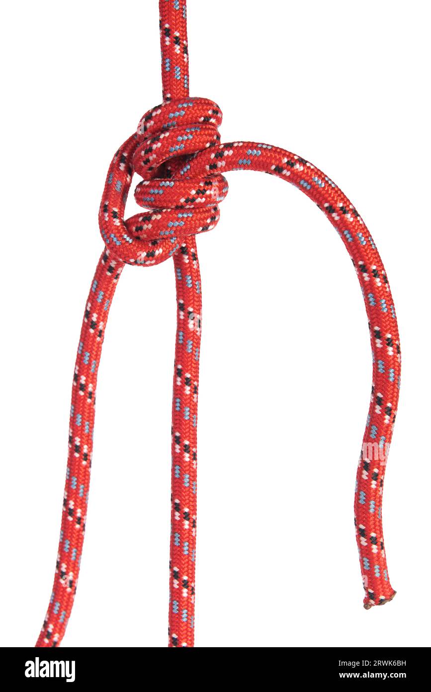 une corde d'escalade rouge nouée sur un fond transparent Banque D'Images