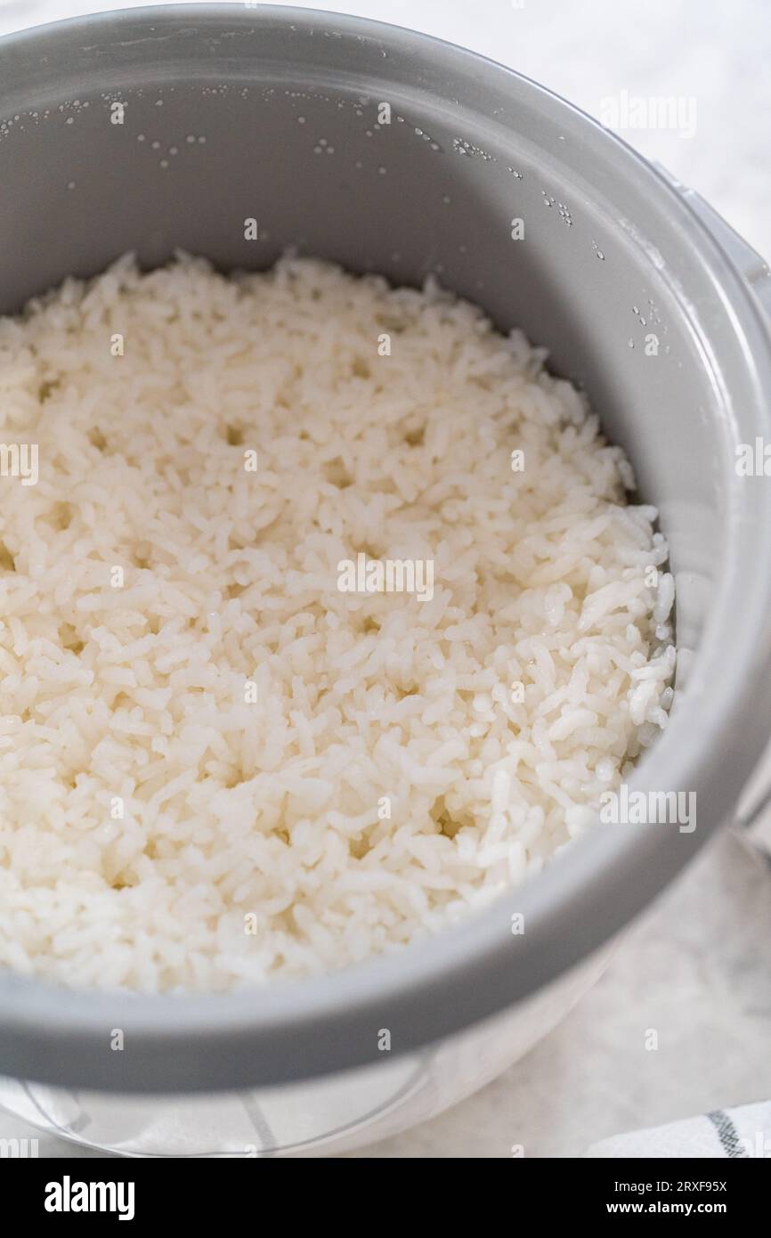 Cuisson du riz Banque D'Images Cuisson du riz Banque D'Images