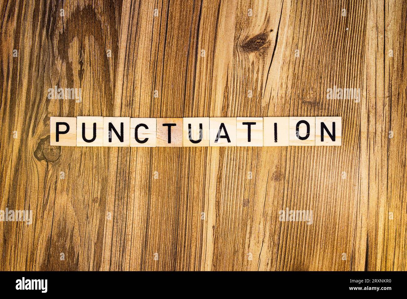 Ponctuation à plat faite de lettres gravées au laser Banque D'Images