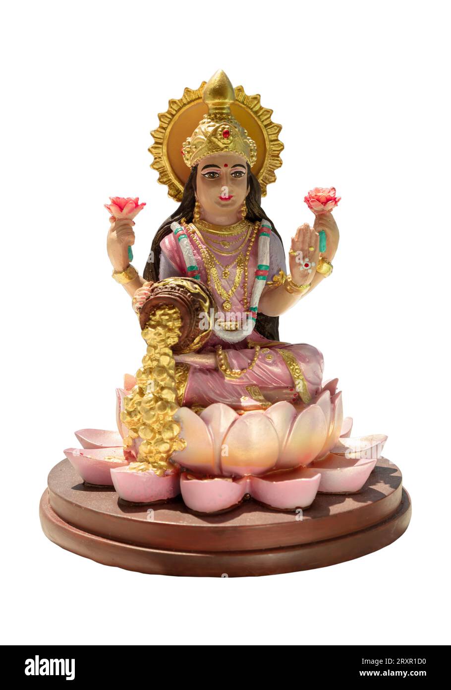 Hindu cosmos Maha laxshmi statue décorée de guirlande de fleurs isolée sur fond blanc avec un chemin d'écrêtage. Statue de la déesse de la richesse, sélective Banque D'Images