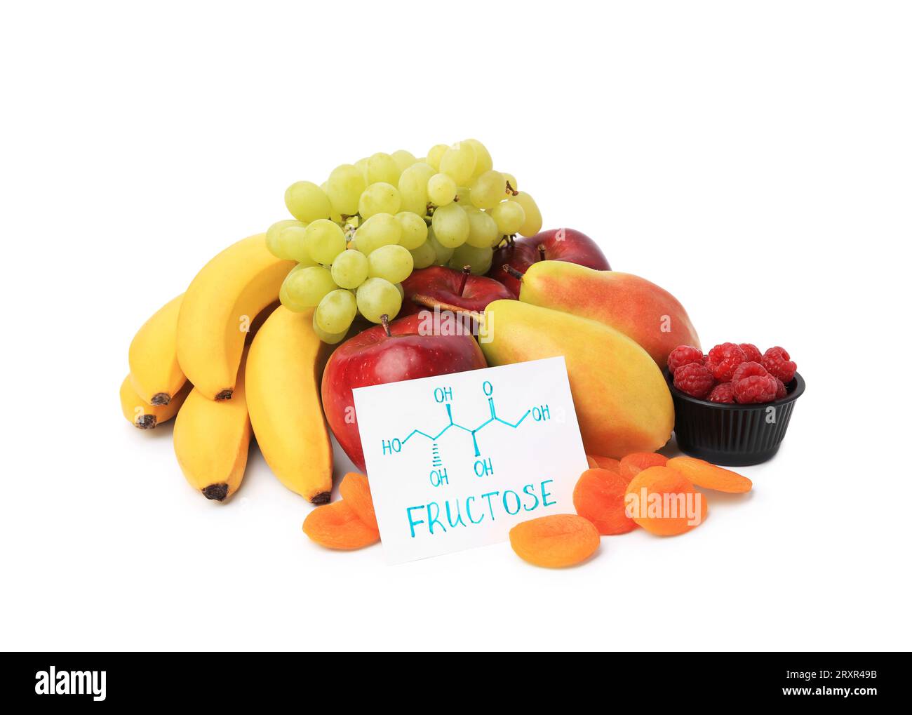 Carte avec mot fructose, délicieux fruits mûrs, framboises et abricots secs isolés sur blanc Banque D'Images