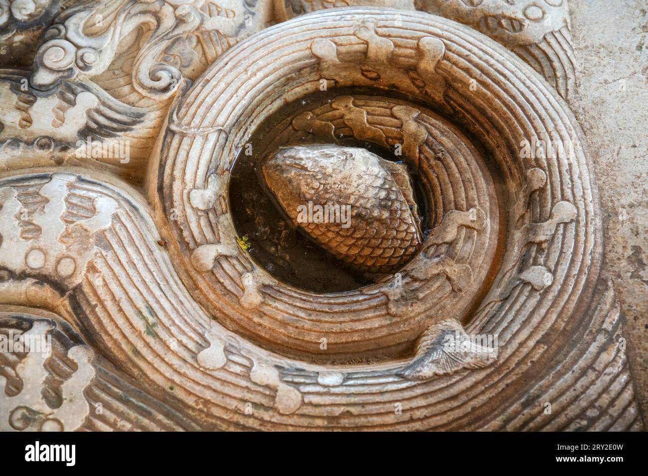 La texture de sculpture sur pierre est sur une dalle de pierre dans les tombes orientales de la dynastie Qing, en Chine du Nord Banque D'Images