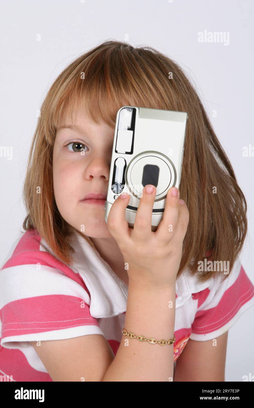 Avec l'appareil photo de l'enfant Banque D'Images