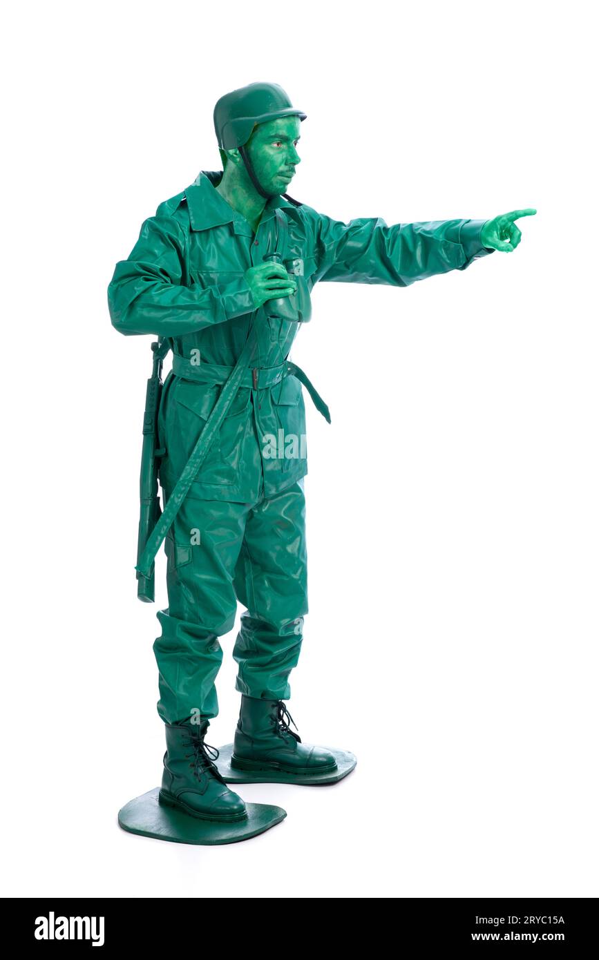 Homme sur un costume de soldat jouet vert Banque D'Images
