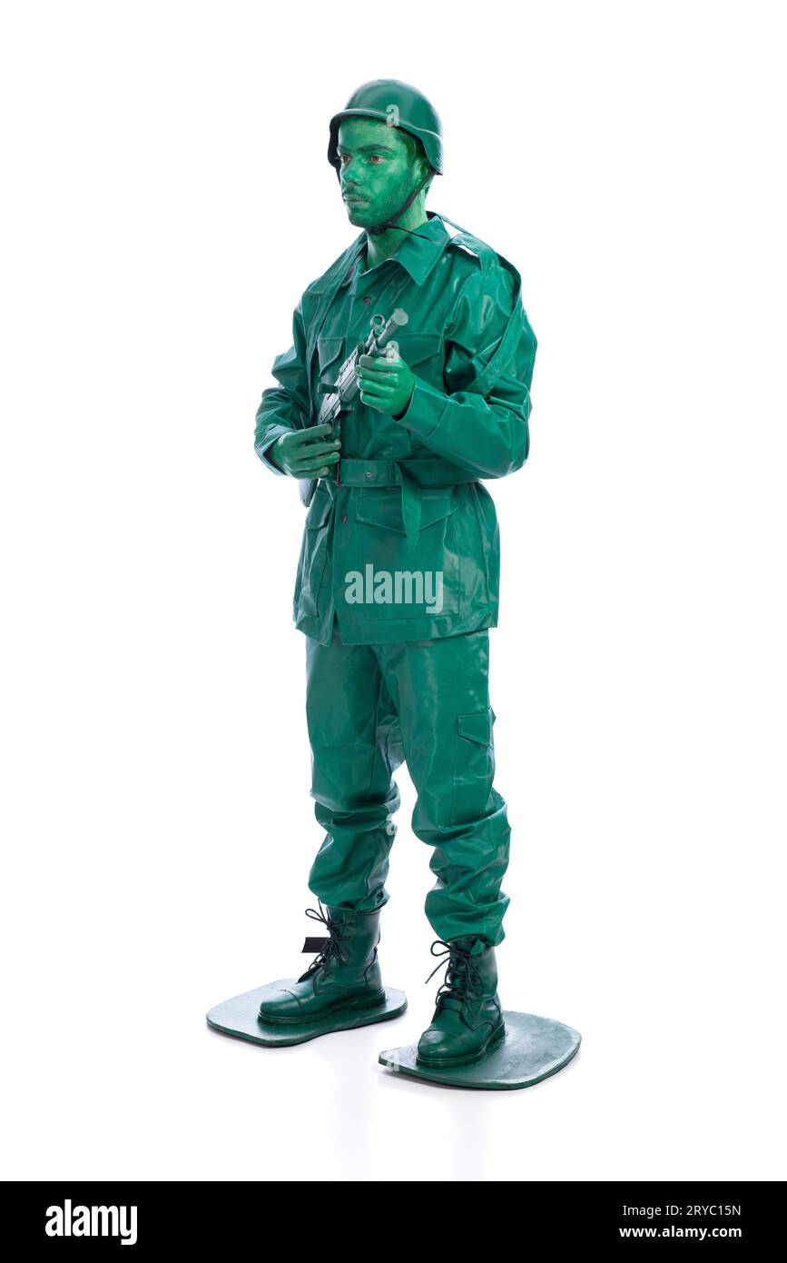 Homme sur un costume de soldat jouet vert Banque D'Images