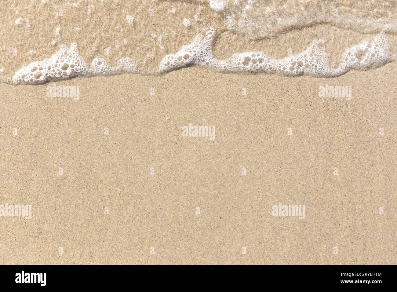 Sable de plage et texture de fond de vague douce Banque D'Images