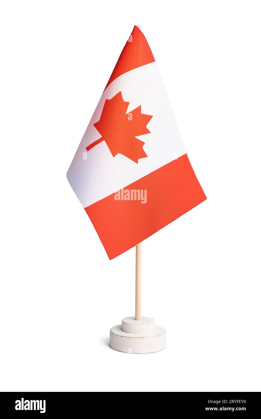 Petit drapeau de table du Canada isolé sur fond blanc Banque D'Images