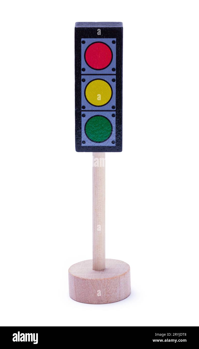 Découpe du feu stop pour jouets sur blanc. Banque D'Images