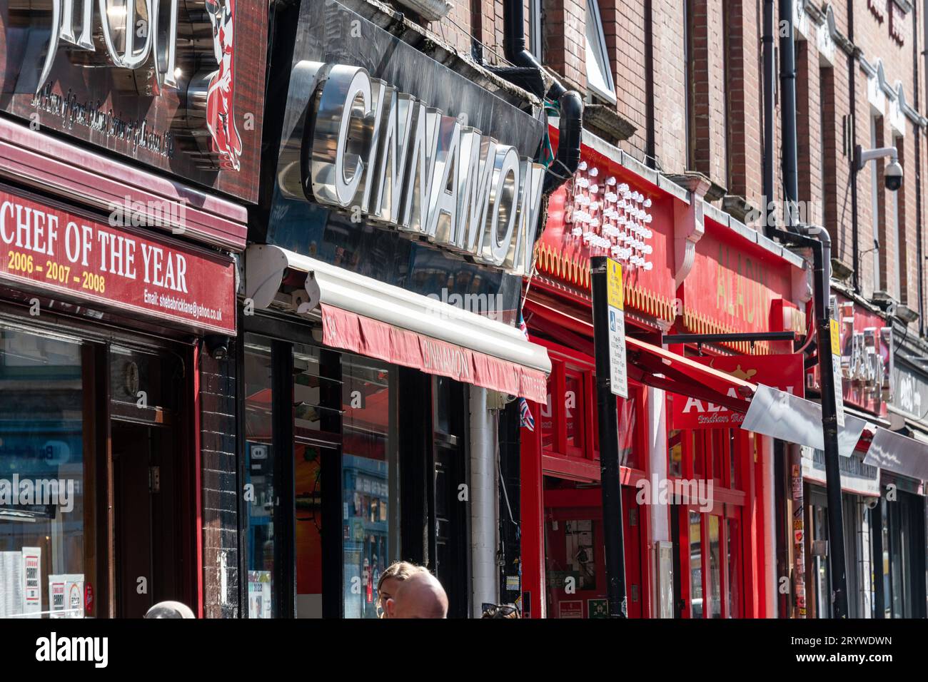 Gros plan des restaurants indiens à Brick Lane, Londres, E1. Banque D'Images