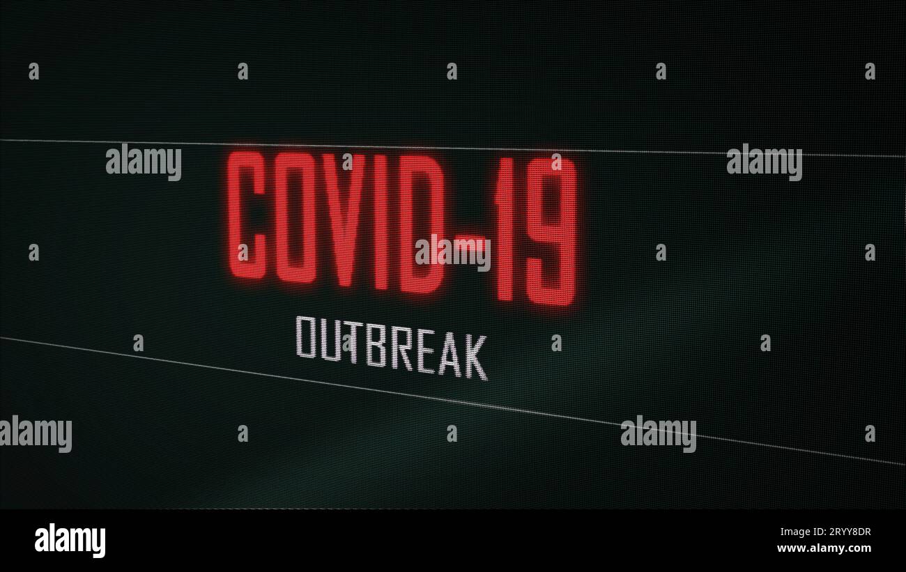 Gros plan rouge coronavirus Covid-19 avertissement d'épidémie texte de scintillement sur l'écran vert pixélisé de l'ordinateur. Santé Banque D'Images
