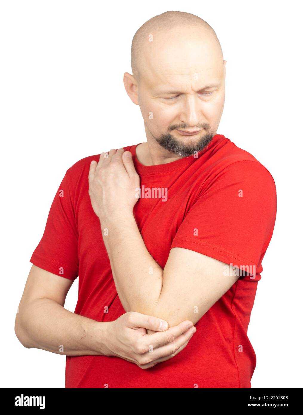 Un homme portant un T-shirt rouge est représenté tenant son coude et son épaule, exprimant douleur et inconfort. Banque D'Images