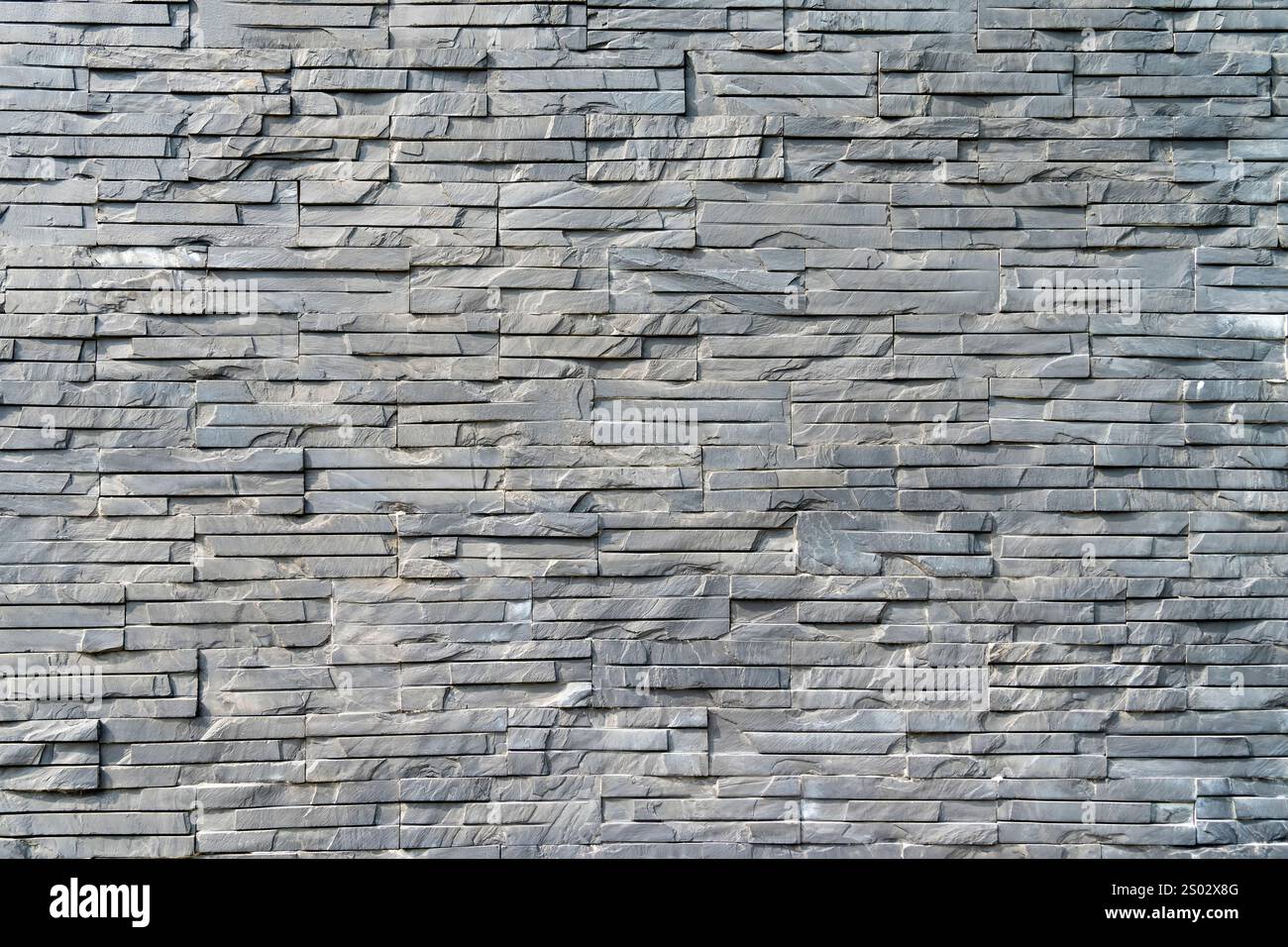 fond gris de mur de briques grunge rugueux Banque D'Images