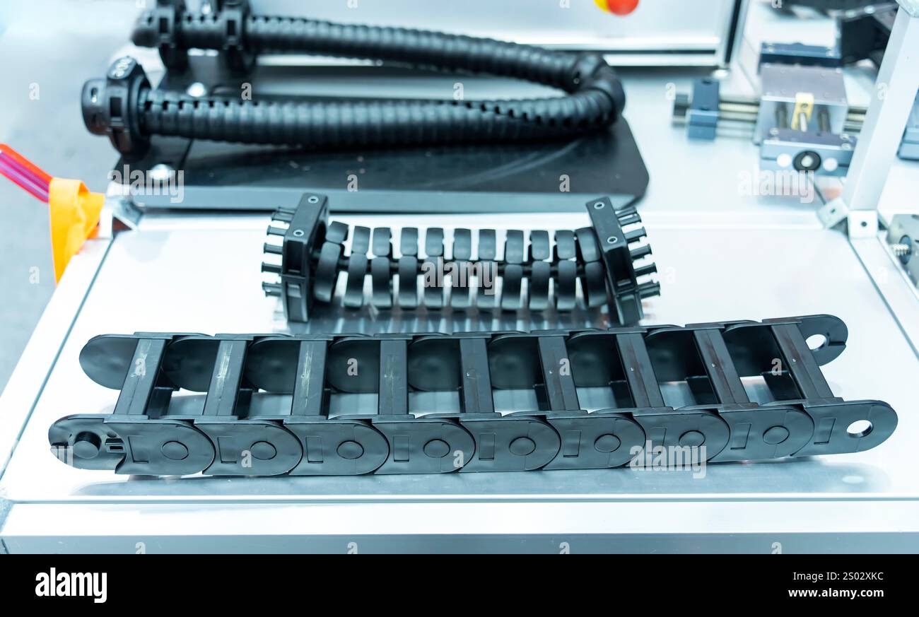 Chaîne de câble en plastique sur machine CNC Banque D'Images