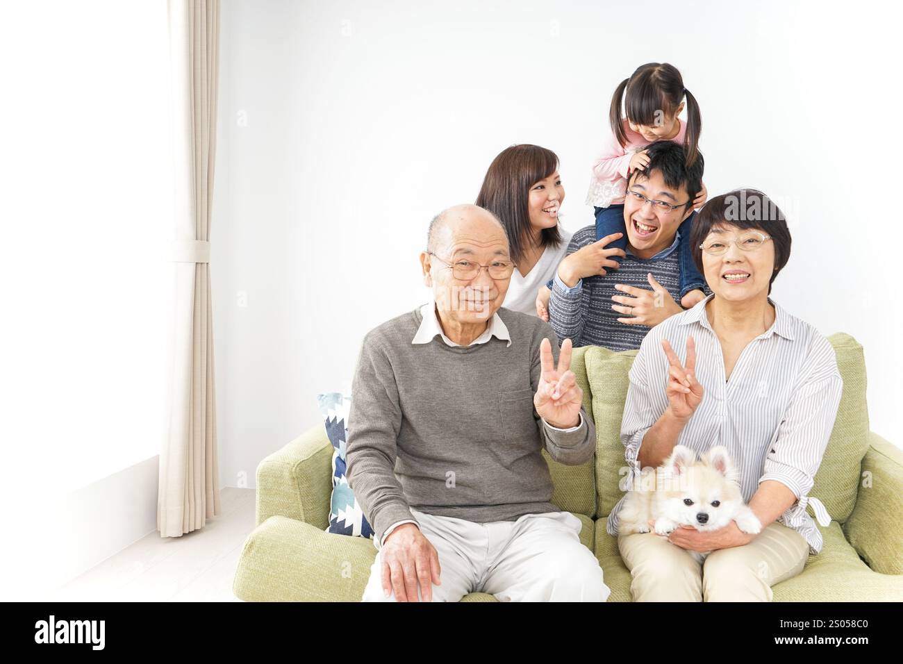 Image photo de groupe familial de trois générations Banque D'Images